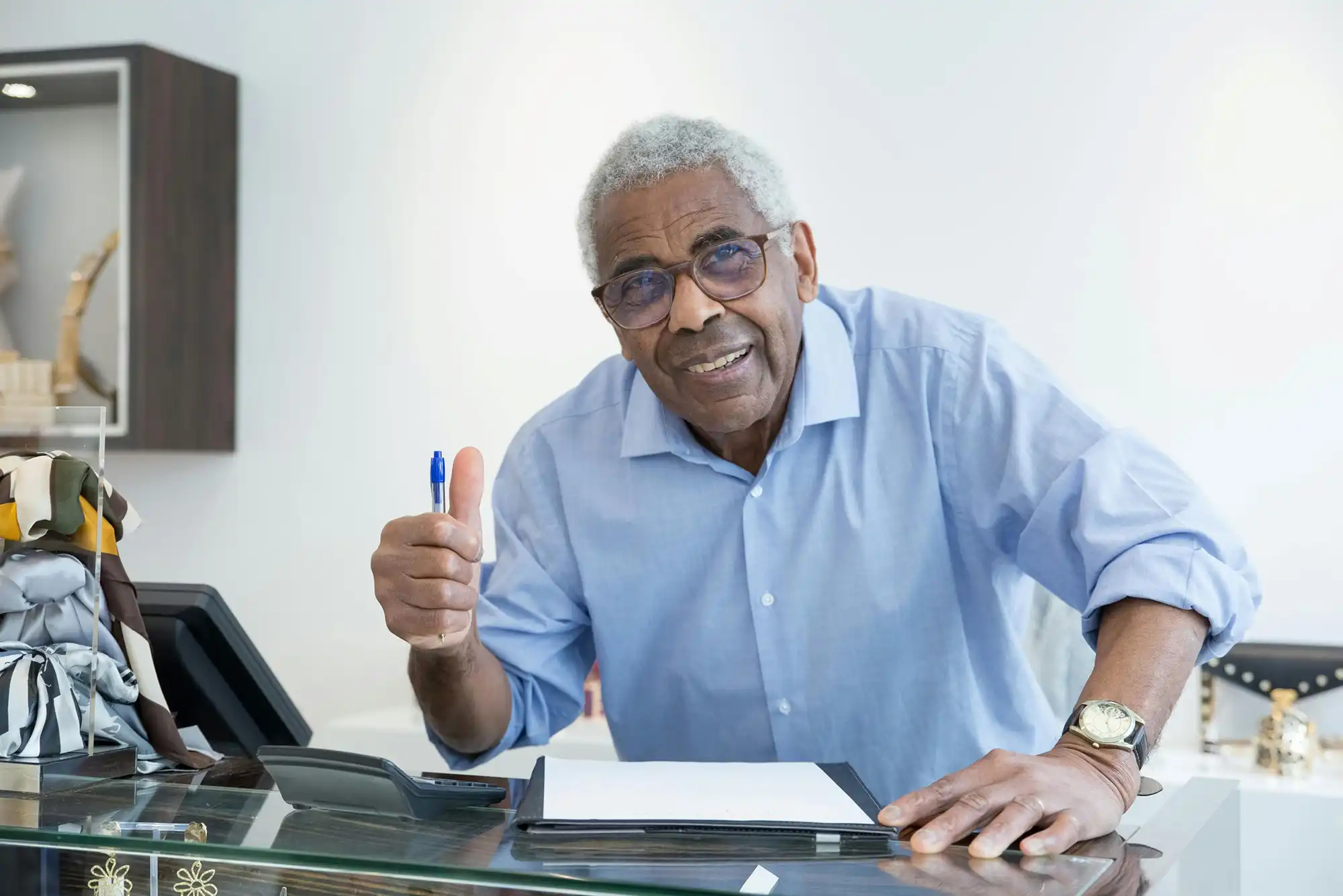 OldHispanic man at desk